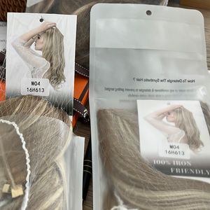 Lula hair extensions. 14” dirty blonde